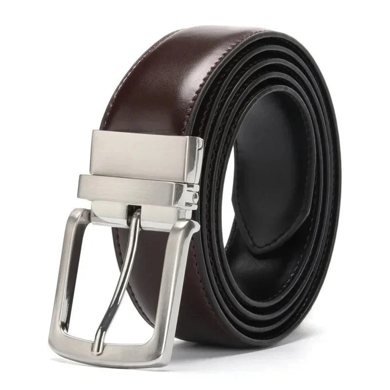 Cinturon reversible enrollado en marron oscuro y negro con hebilla metalica giratoria