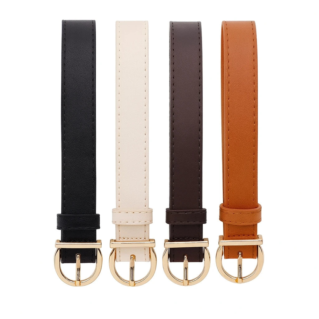 cuatro cinturones de símil cuero en negro blanco marrón y camel con hebilla dorada vistos de frente